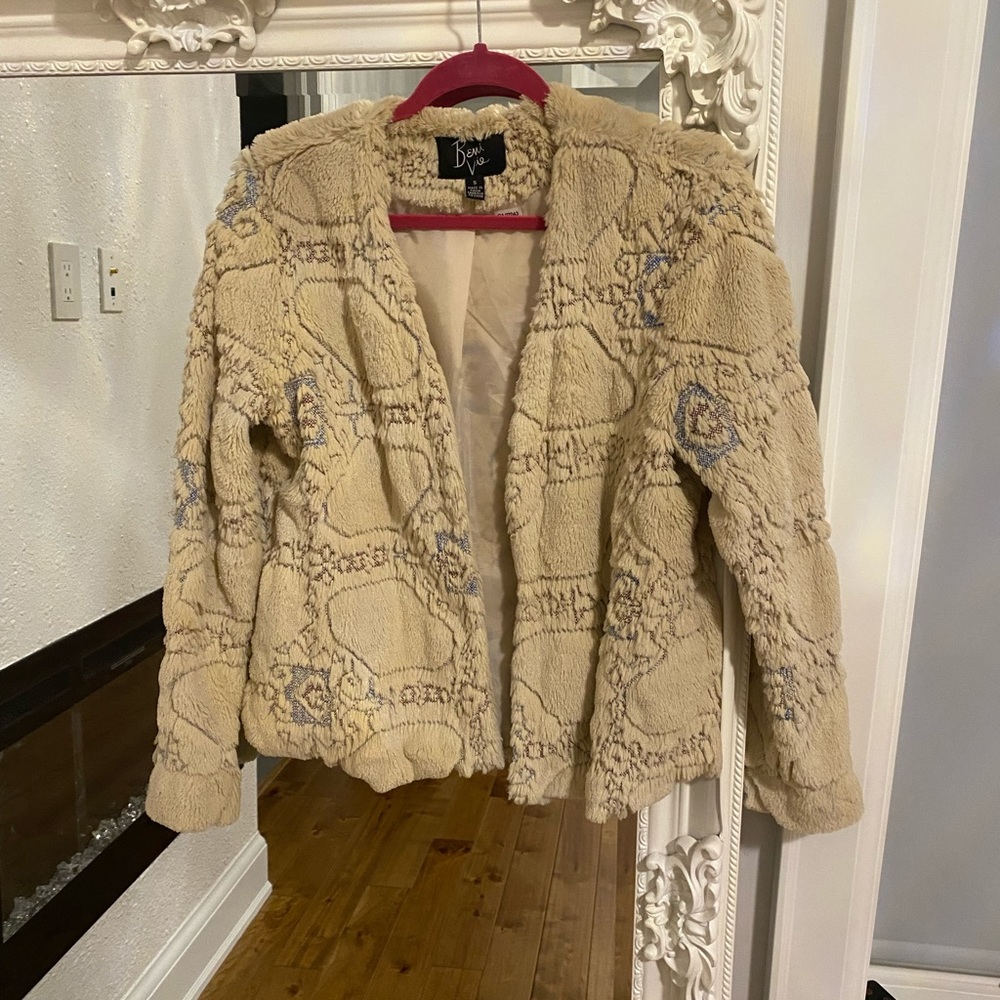 Cream faux fur coat